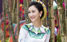 Á hậu Hà Thu mặc áo dài truyền thống đi xin chữ đầu năm
