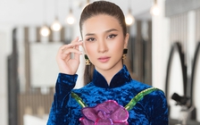 Kim Tuyến diện áo dài đi sự kiện