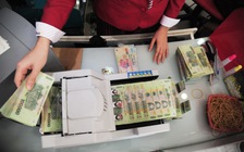 Ngân hàng giảm vay ‘nóng’ lẫn nhau