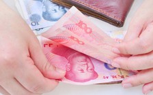 Giảm mạnh 0,7%, giá nhân dân tệ thấp kỷ lục