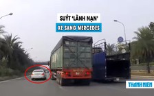 Xe sang Mercedes suýt gặp nạn vì hai container ‘chạy như đua’