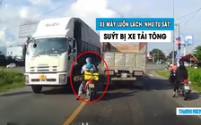 Thanh niên lái xe máy lấn làn ‘như tự sát’, suýt bị xe tải tông trúng