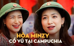 Hòa Minzy đội mũ cối sang Campuchia cổ vũ đội tuyển pencak silat