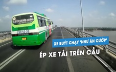 Xe tải bị xe buýt vượt ẩu, chèn đường suýt lao vào thành cầu