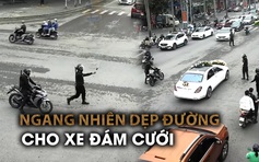 Xôn xao nhóm ‘vệ sĩ’ ngang nhiên dẹp đường cho xe đám cưới