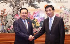Chủ tịch Quốc hội Vương Đình Huệ hội kiến Chủ tịch Chính hiệp toàn quốc Trung Quốc