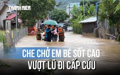 Xúc động hình ảnh công an Cao Bằng che chở em bé sốt cao vượt lũ đi cấp cứu