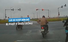 Nam thanh niên lái xe máy vượt đèn đỏ bị phạt 5 triệu, trừ 4 điểm GPLX