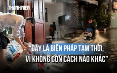 Người dân TP.HCM dựng ba lớp chắn vẫn không chống nổi triều cường