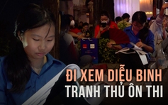 Nữ sinh mang theo sách vở ôn thi trước giờ diễu binh 30.4, nói một câu đầy xúc động