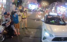 CSGT TP.HCM đón taxi, mở đường đưa người đi cấp cứu: Người dân phản ứng bất ngờ