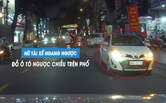 Nữ tài xế ngang ngược đỗ ô tô ngược chiều trên phố... chờ đón con