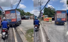 TP.HCM: Xe tải leo vỉa hè vượt xe khác gây bức xúc