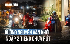 Mưa lớn ở TP.HCM, đường Nguyễn Văn Khối ngập hơn nửa mét suốt 2 tiếng chưa rút