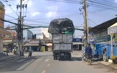 Phạt nặng tài xế xe tải chở hàng vượt quá chiều cao quy định, gây tai nạn