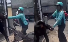 Xác minh clip người mặc áo xe công nghệ cầm hung khí đánh người đi đường