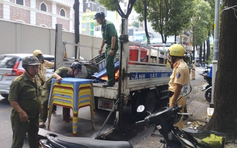 Lấn chiếm vỉa hè trung tâm TP.HCM: Nhiều xe bánh mì, tủ nước mía bị tạm giữ