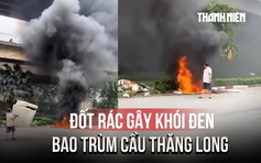 Ngang nhiên đốt rác tạo khói đen bao trùm cầu Thăng Long