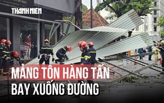 Kinh hoàng mảng tôn hàng tấn bị gió cuốn bay xuống đường giữa giờ cao điểm