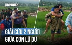 Giải cứu 2 người mắc kẹt giữa nước lũ ở Lai Châu
