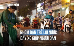 TP.HCM mưa lớn, người dân bì bõm dắt xe qua đoạn ngập: Hành động của nhóm sinh viên gây chú ý