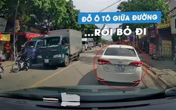 Ô tô con đỗ giữa đường, bật đèn cảnh báo nguy hiểm… nhưng không thấy tài xế