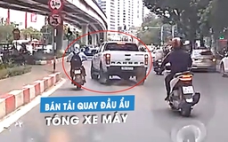 Bật đèn xi-nhan rồi lập tức chuyển hướng, xe bán tải suýt tông chết người trên phố