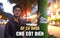 Cột điện TP.HCM được ốp cỏ nhựa: Người dân thấy đẹp, quảng cáo rác vẫn chưa buông tha