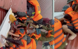 Xúc động clip công an Thái Nguyên cứu người mắc kẹt vì lũ: 'Thương lắm bà con!'