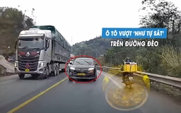 Kinh hoàng ô tô vượt cả hàng xe ngay đoạn cua, suýt gây tai nạn đối đầu