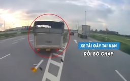 Xe tải đè vạch xương cá, tạt đầu quệt văng gương ô tô khác rồi bỏ chạy