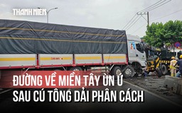 Xe tải tông dải phân cách, đường về miền Tây chật vật giữa trời mưa