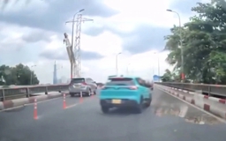TP.HCM: Xác minh clip taxi lạng lách, vượt ẩu trên cầu Bình Triệu