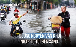 Đường Nguyễn Văn Khối ngập từ tối đến sáng, người dân chật vật dắt xe qua 'biển nước'