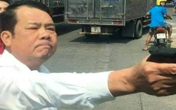 Giám đốc công ty bảo vệ cầm súng dọa ‘bắn vỡ sọ’ tài xế xe tải