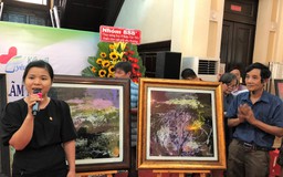 Họa sĩ Đoàn Việt Tiến lập kỷ lục vẽ tranh trên kính