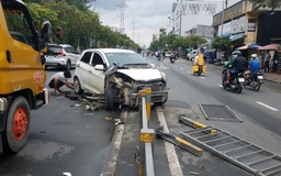 TP.HCM: Đo nồng độ cồn tài xế lái ô tô tông dải phân cách đường Kinh Dương Vương, Q.6
