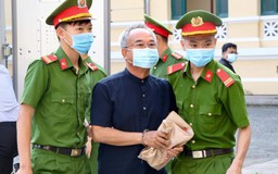 Ông Nguyễn Thành Tài bị áp giải đến tòa trong vụ án thứ 2
