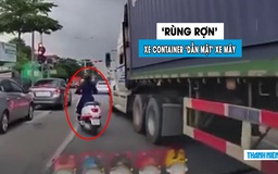 Rùng rợn cảnh tài xế xe container tạt đầu, ‘dằn mặt’ người phụ nữ lái xe máy