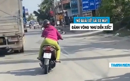 Phẫn nộ người phụ nữ lái xe máy buông tay, lạng lách 'như diễn xiếc'