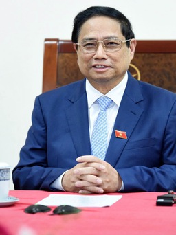 Thủ tướng Phạm Minh Chính mời tân Thủ tướng Singapore Lawrence Wong sớm thăm Việt Nam