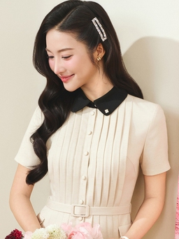 Váy xếp ly, điểm nhấn cho phong cách công sở hiện đại