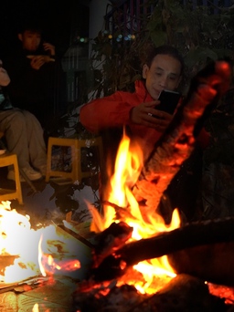 Người lao động Hà Nội đốt lửa xuyên đêm chống chọi giá rét đầu mùa