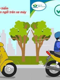 Nguy hiểm khi để trẻ ngồi trước người điều khiển xe máy