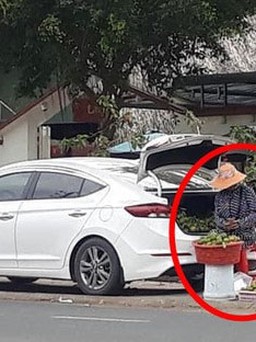 Cư dân mạng quan tâm: Người phụ nữ dùng xe hơi đi bán cam lề đường