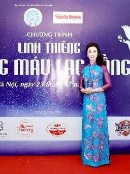 Hoa hậu Vũ Thúy Nga nền nã trong tà áo dài của NTK Lan Hương