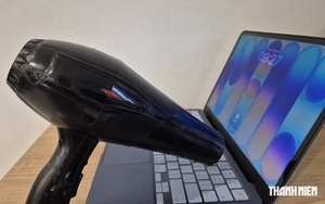 Đi trong trời mưa, laptop, điện thoại dính nước, phải làm sao?