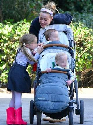 Amber Heard lui về ở ẩn cùng 3 con sau sóng gió