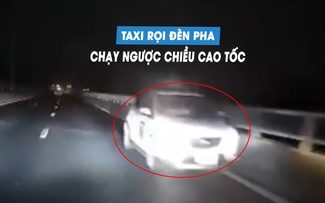 Xe taxi chạy ngược chiều cao tốc giữa đêm, bật đèn pha khiến người khác lóa mắt