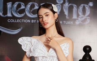 Hoa hậu Huỳnh Trần Ý Nhi gợi cảm khi diện váy của Nguyễn Minh Tuấn
